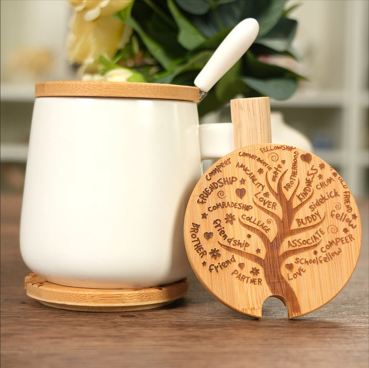 White ceramic mug featuring a personalized engraved design on its wooden lid