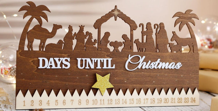 A wooden Advent calendar depicting the Nativity of Jesus, featuring a "Christmas countdown" display made by sculpfun laser cutter.